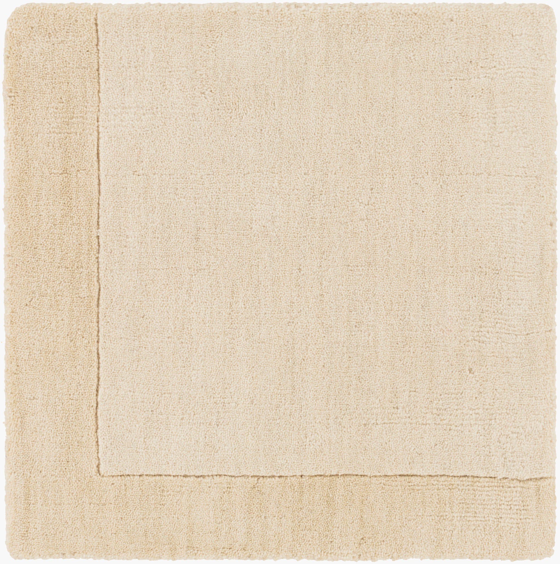 The Subtle Border Ivory Rug, measuring 8' x 11', is a rectangular wool area rug in beige with a subtle border pattern, shown flat on a white background.