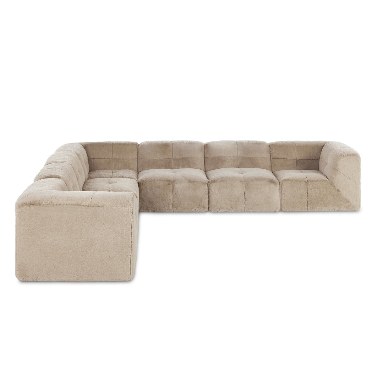 The Plush Sectional - 7pc is a modular, L-shaped sofa with plush fabric upholstery, tufted cushions, and S-spring suspension, shown from the front on a white background.