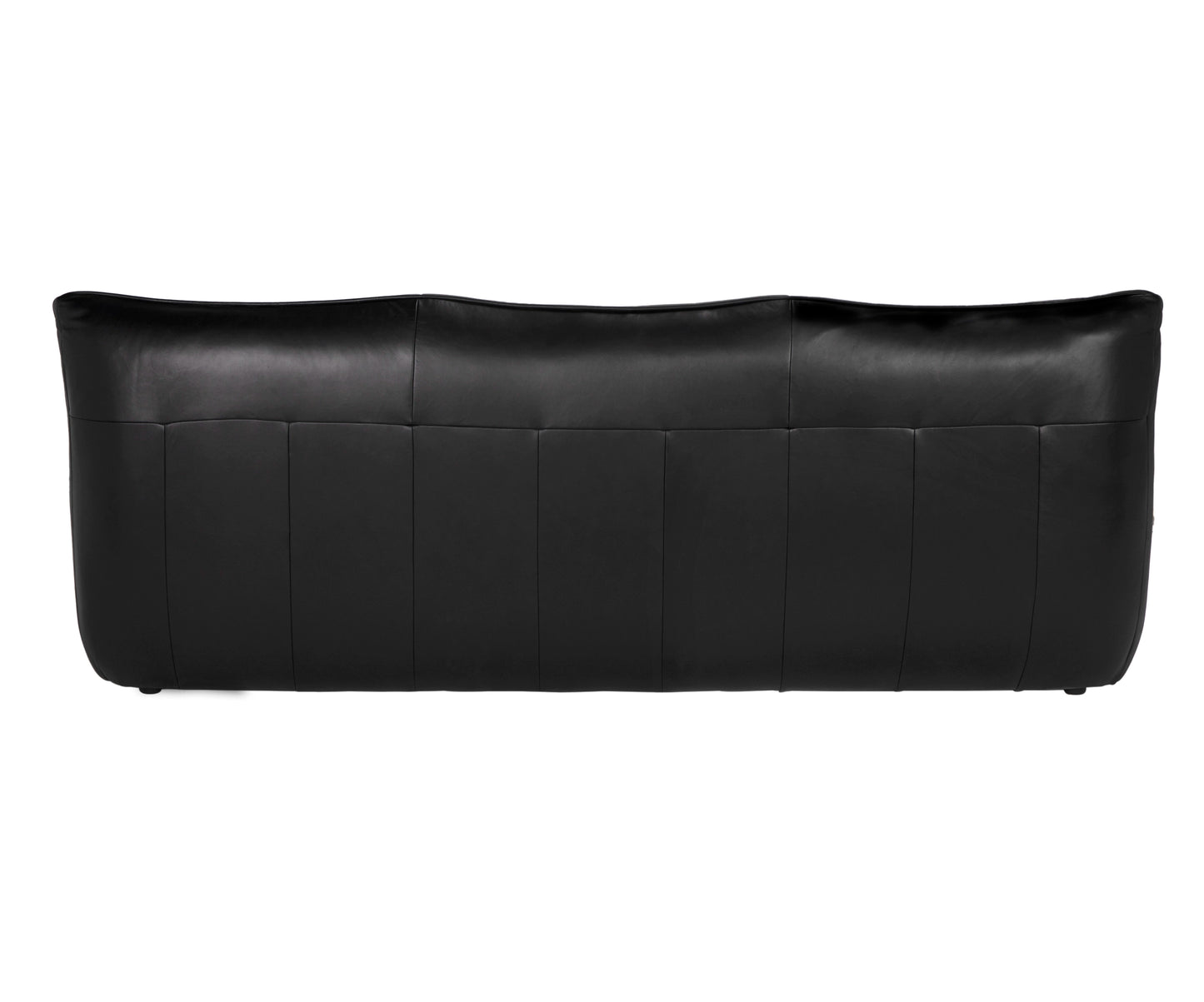 The Leather Low Profile 3 Seater is a black full-grain leather sofa with a smooth, slightly curved backrest, vertical stitching details, and a minimalist design featuring no visible legs when viewed from the back.