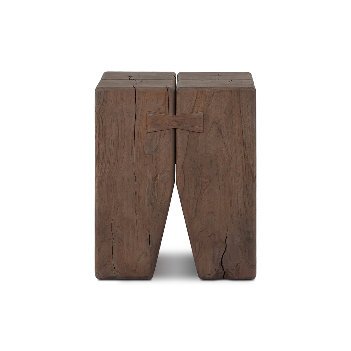 The Teak Outdoor End Table features a pair of square, rustic solid teak wooden stools with visible natural grain and cracks, joined at the center by a wooden butterfly joint, and is photographed against a white background.