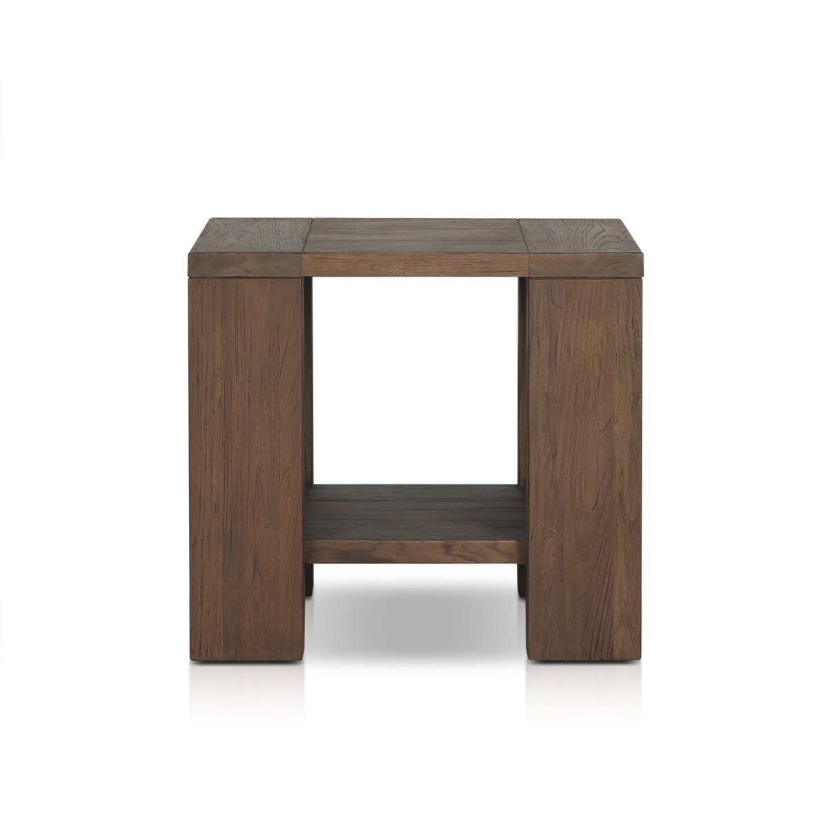 The Outdoor Chunky Square End Table is crafted from reclaimed teak wood with thick legs, a lower shelf, and a medium brown finish. Its simple, modern design makes it perfect as outdoor furniture shown against a white background.