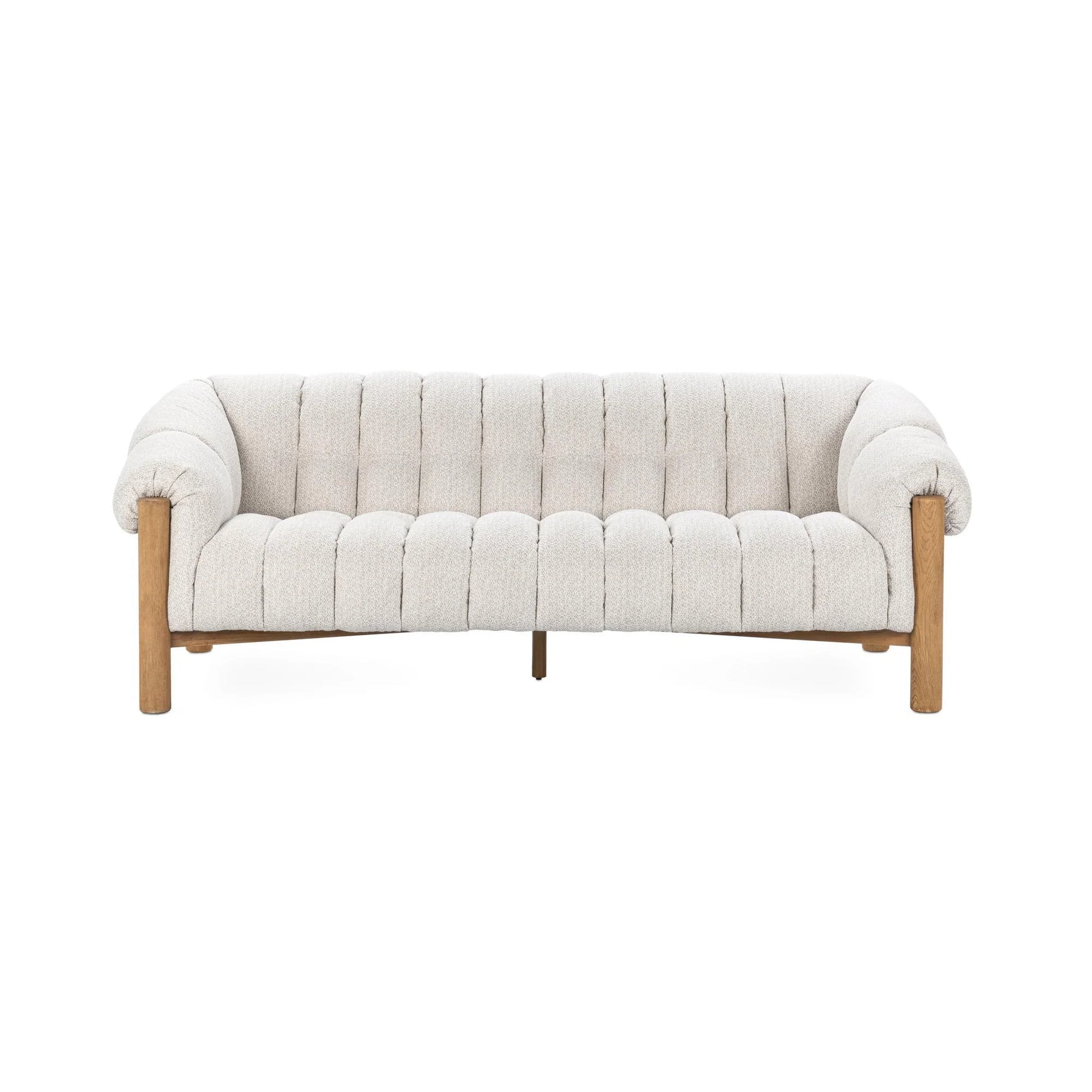 The Plush Upholstered Sofa features a modern, tufted design in light beige with rounded armrests, brushed oak wood legs, and plush, textured polyester fabric for contemporary style.