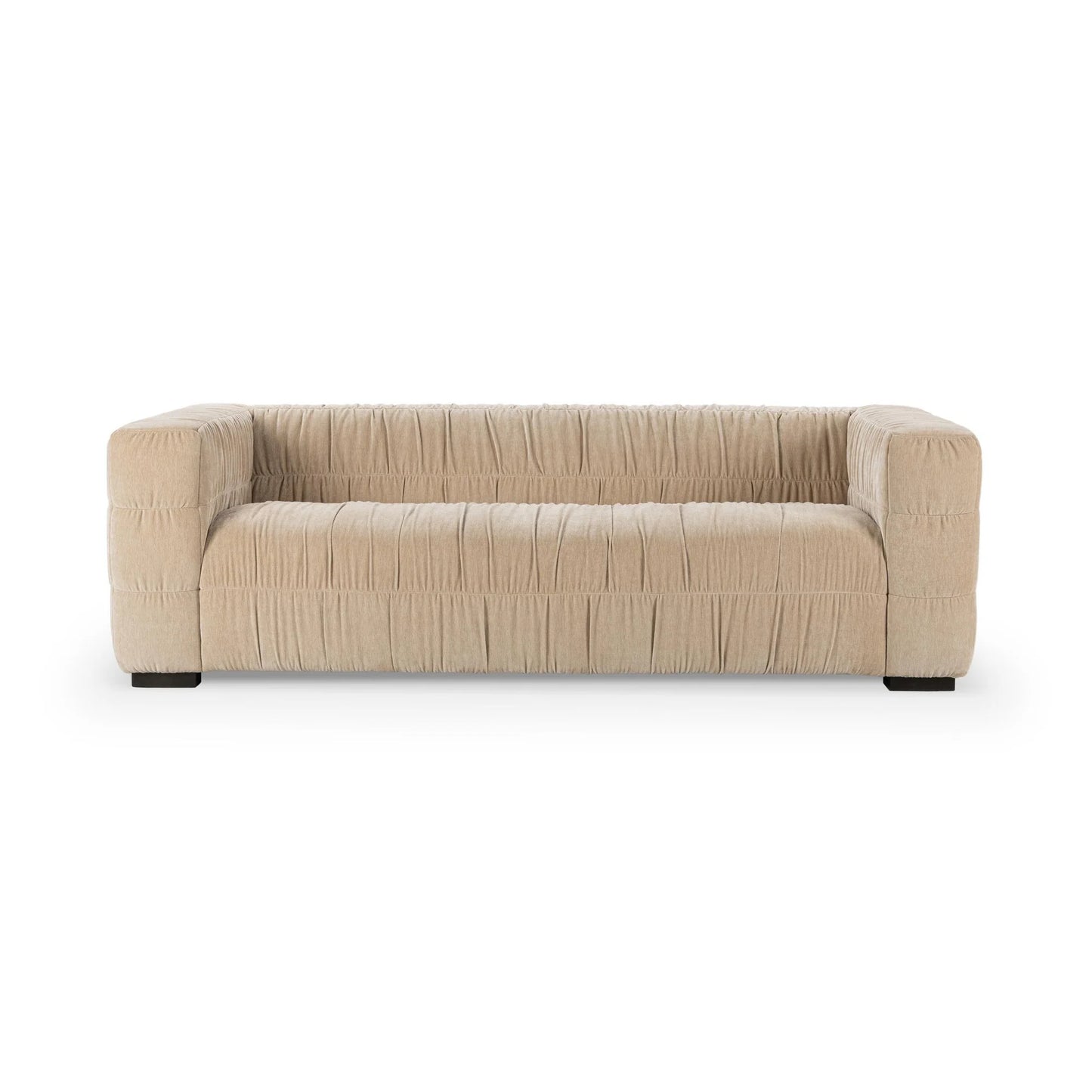 The Ruched Upholstered Sofa features wide square arms and luxurious textured upholstery, showcased against a plain white background to highlight its modern artistry in home design.