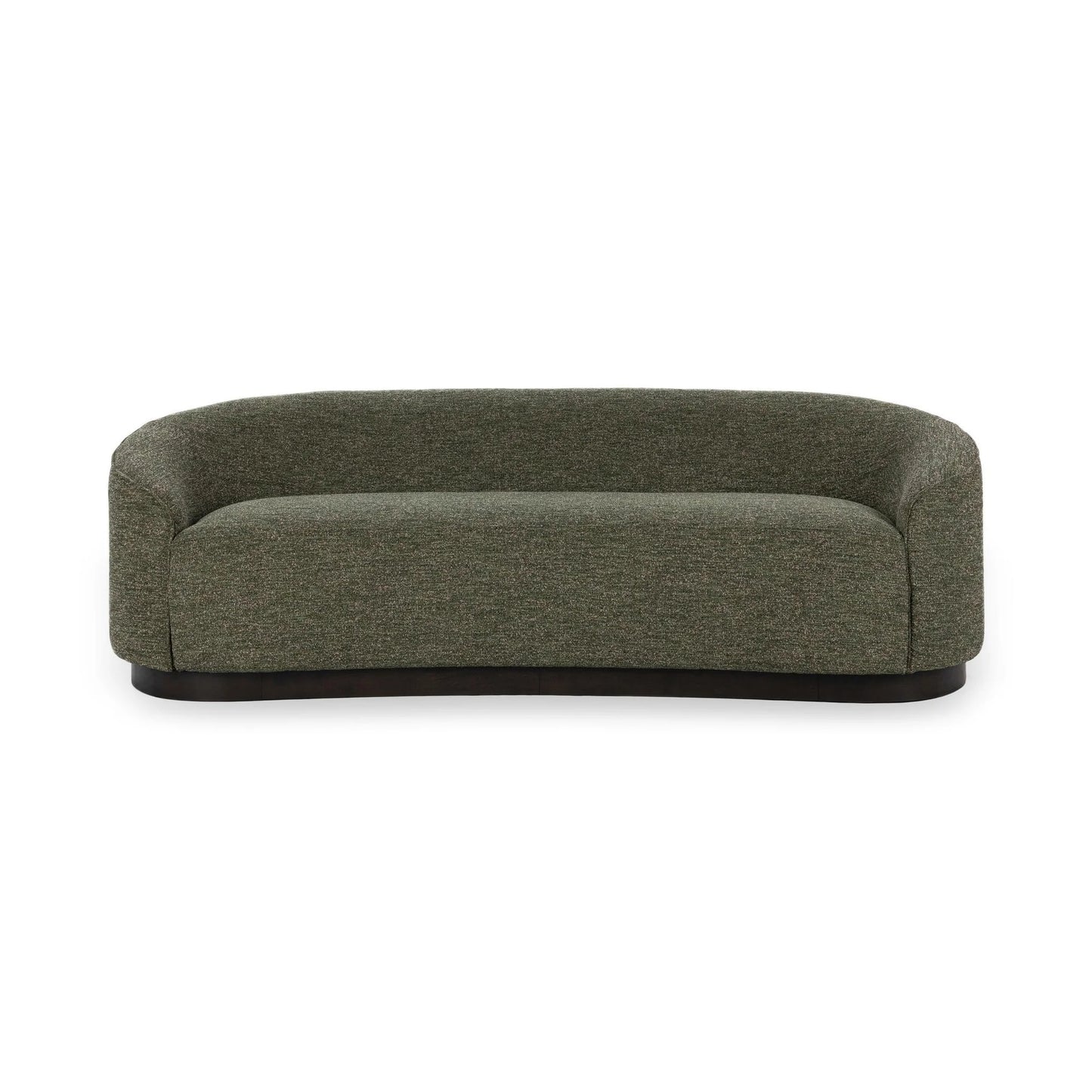The Curved Sofa showcases a modern sculptural design with dark green upholstery, low rounded arms, and a sleek black base, displayed against a plain white background.