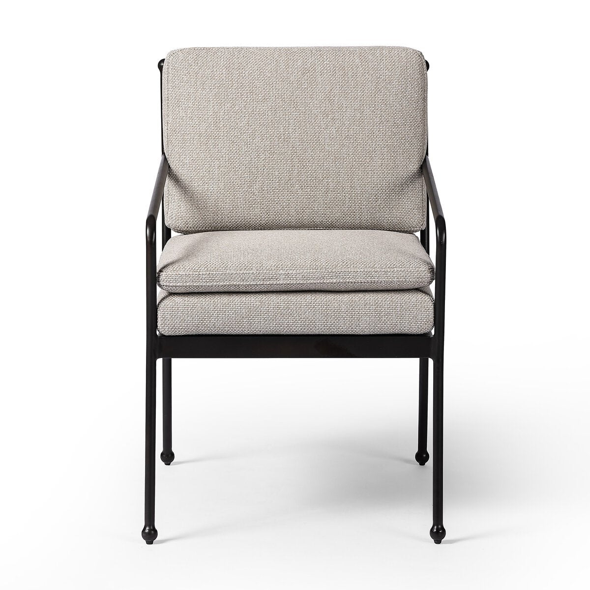 The French Decco Outdoor Dining Armchair features a black metal frame with light gray textured seat and back cushions, French Deco-inspired details, and double seat cushioning, pictured against a white background.