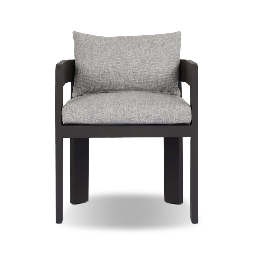 The Outdoor Metal Dining Chair features a sleek black frame, open sides, and light gray cushioned seat and backrest, displayed against a white background.