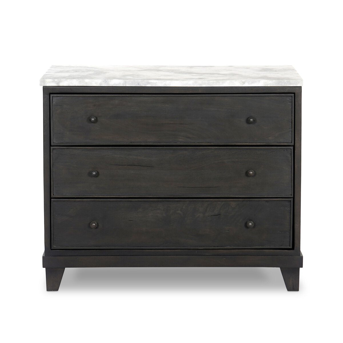 The French Nightstand is a dark solid mango wood dresser with three drawers, round knobs, and a white marble top on four short legs, capturing vintage charm against a simple white background.