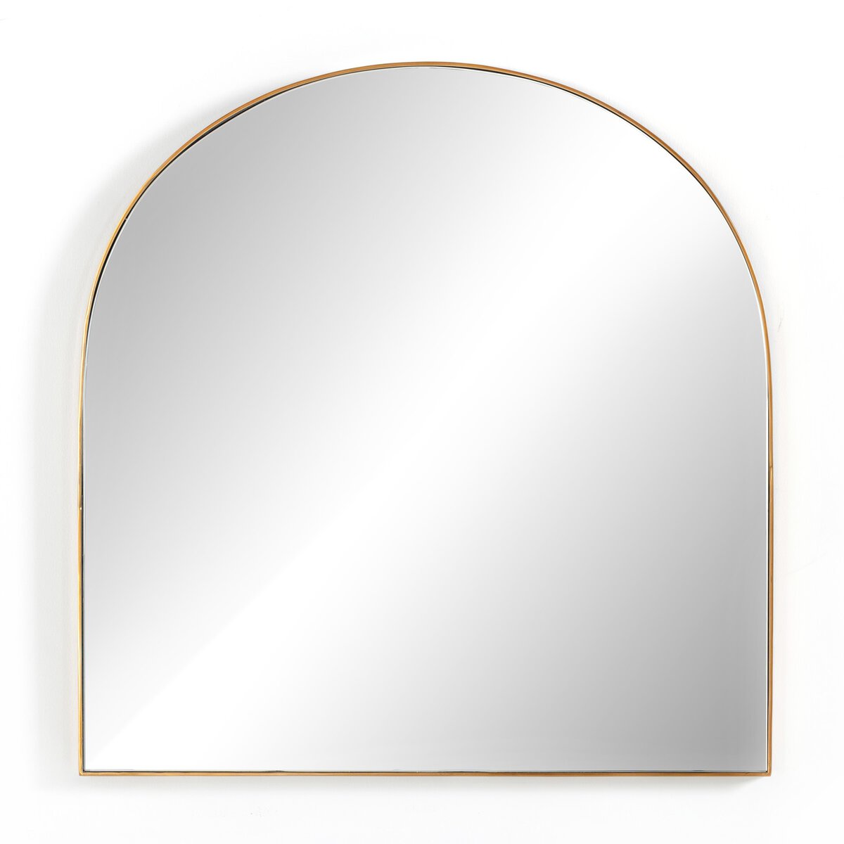 The Georgina Wide Mirror features a large arched design with a slim gold frame, displayed against a plain white background.
