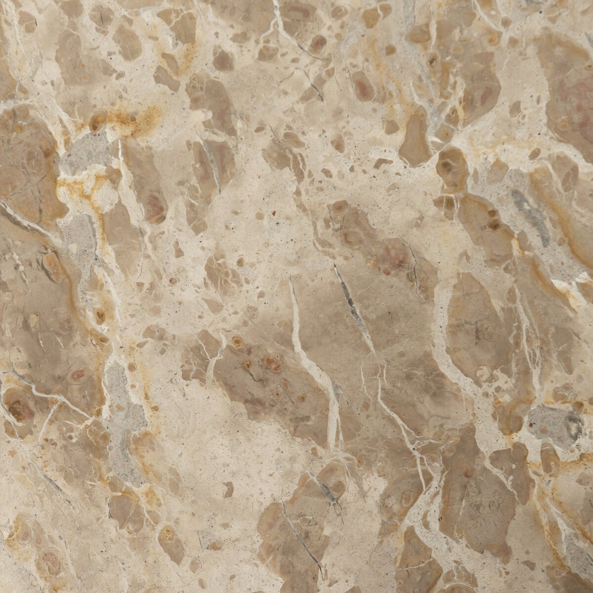 The Marble Top Hourglass End Table features a beige and light brown marble surface with natural, irregular veins, smooth texture, organic lines, and subtle tan, cream, and gray spots—ideal as a striking accent piece in any room.