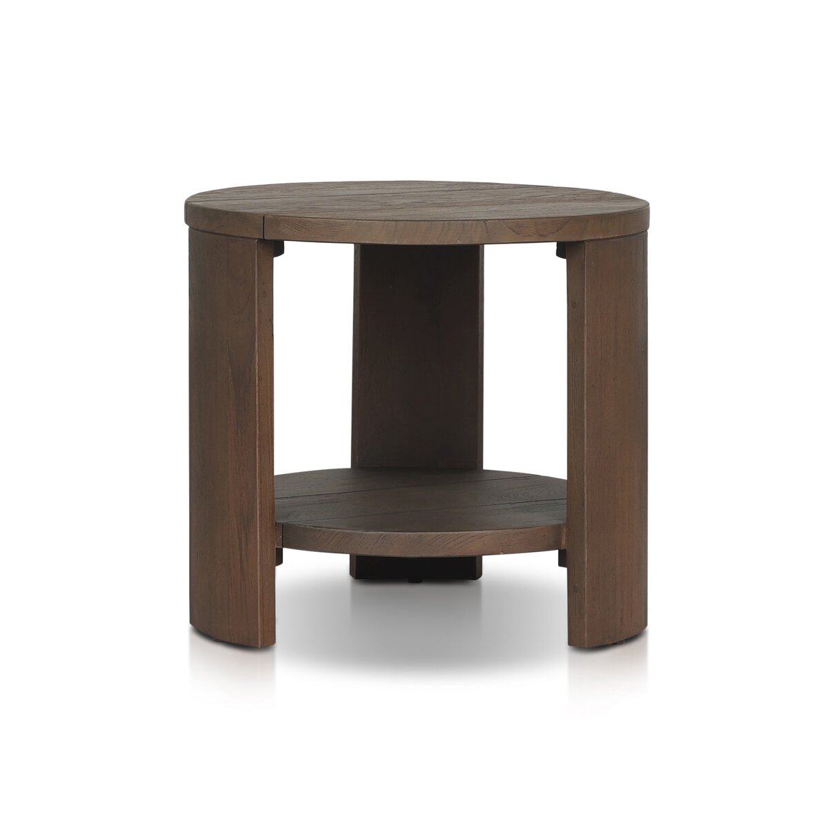 The Outdoor Chunky Round End Table features three thick legs, a lower shelf, and is crafted from FSC-certified reclaimed teak wood. Finished in medium brown stain, it's shown against a white background.