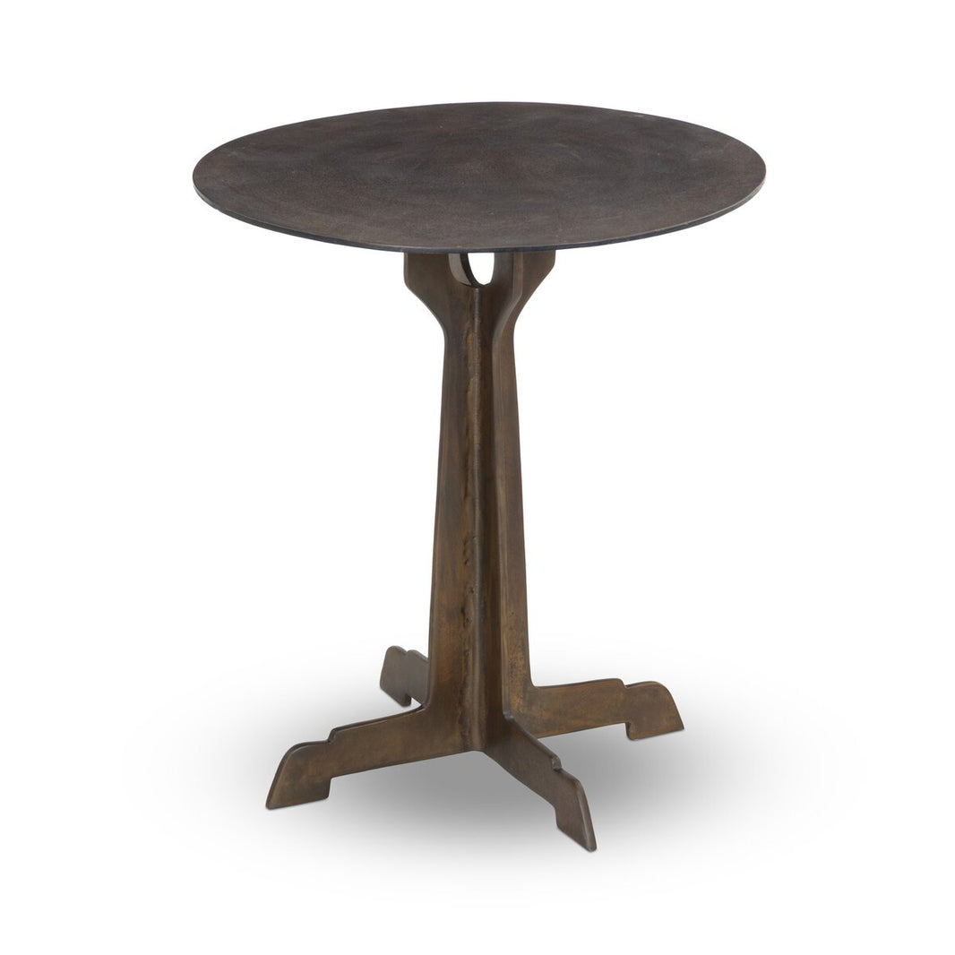 The Copper-Toned Outdoor End Table is a small, round metal piece with an antiqued finish and a central pedestal base with three angular feet—ideal as modern outdoor furniture.