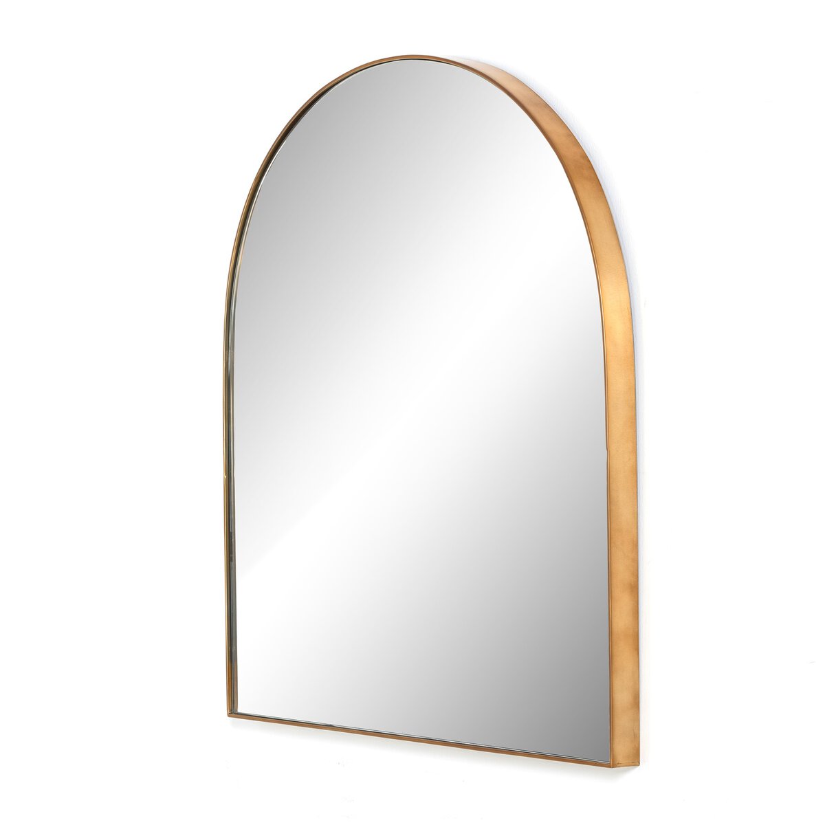 The Georgina Wide Mirror is a large, arched mirror with a thin gold metallic frame, shown against a white background. It features a modern, minimalist design perfect for contemporary decor.