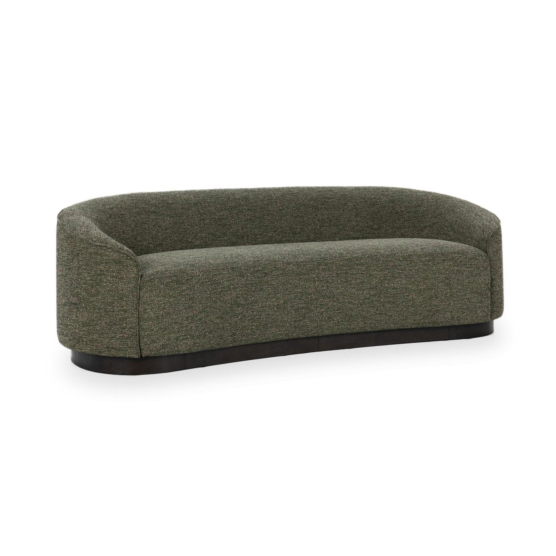 The Curved Sofa is a modern upholstered piece in textured green fabric, featuring a low back and seat on a dark, subtly rounded base.