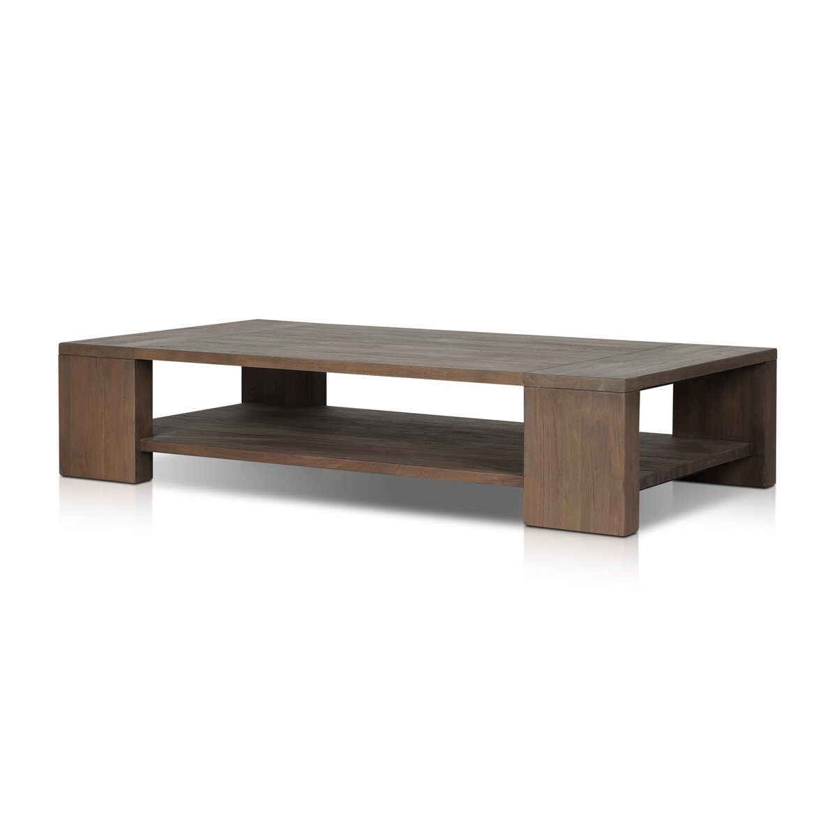 The Outdoor Chunky Rectangle Coffee Table is made from reclaimed teak wood with thick block legs, an open lower shelf, and a smooth dark brown finish.