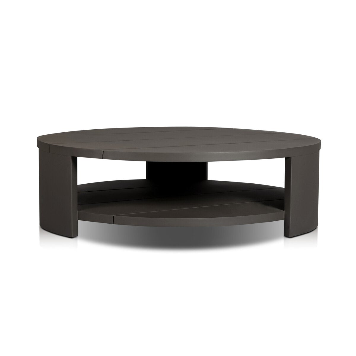 The Bronze Finished Aluminum Round Coffee Table features a modern, minimalist design, a smooth bronze finish, wide surface, and a lower shelf for storage.