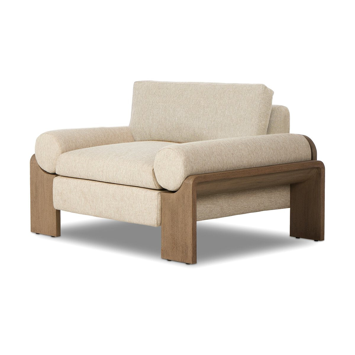 The Joette Outdoor Chair features light beige upholstery, a wide cushioned seat and backrest, cylindrical armrests, and a sturdy wooden frame with a natural finish—ideal for spaces where size and furniture measurements matter.