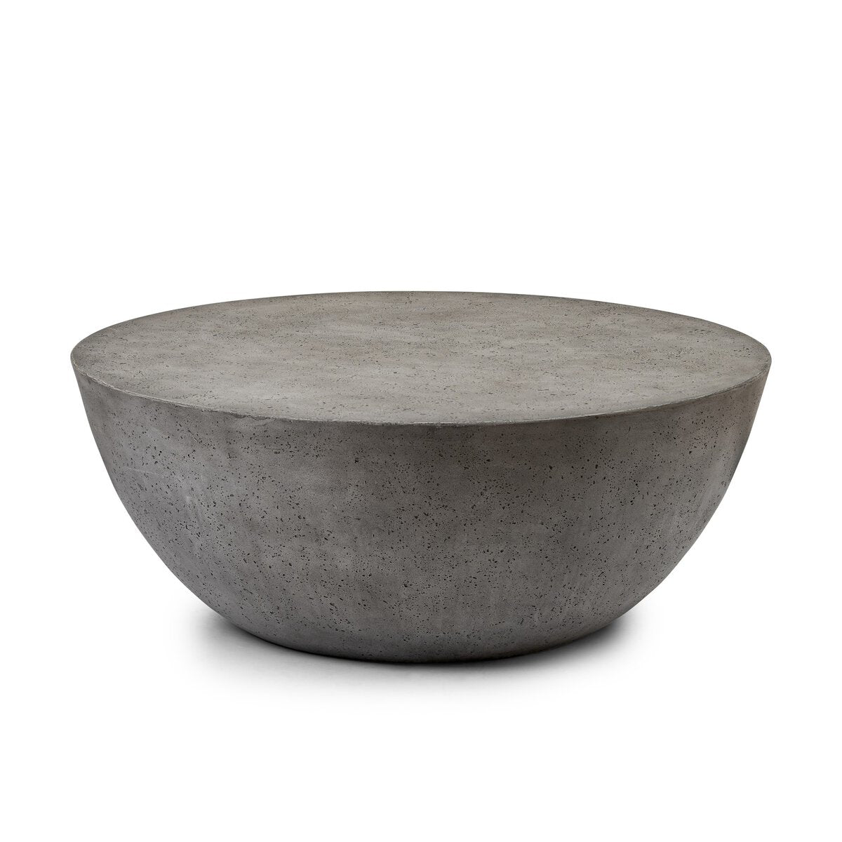 The Concrete Bowl Shaped Outdoor Coffee Table features a round, minimalist design with a smooth, flat top and slightly textured surface, ideal for indoor or outdoor spaces. Pictured here against a white background.
