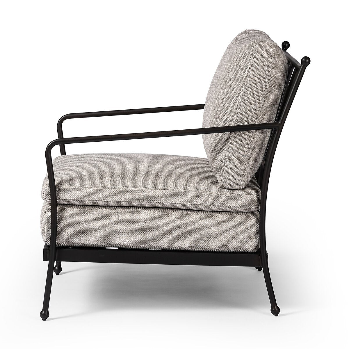 Side view of the French Decco Outdoor Chair with a black metal frame, light gray double seat cushions, and a matching back cushion, all set against a plain white background.