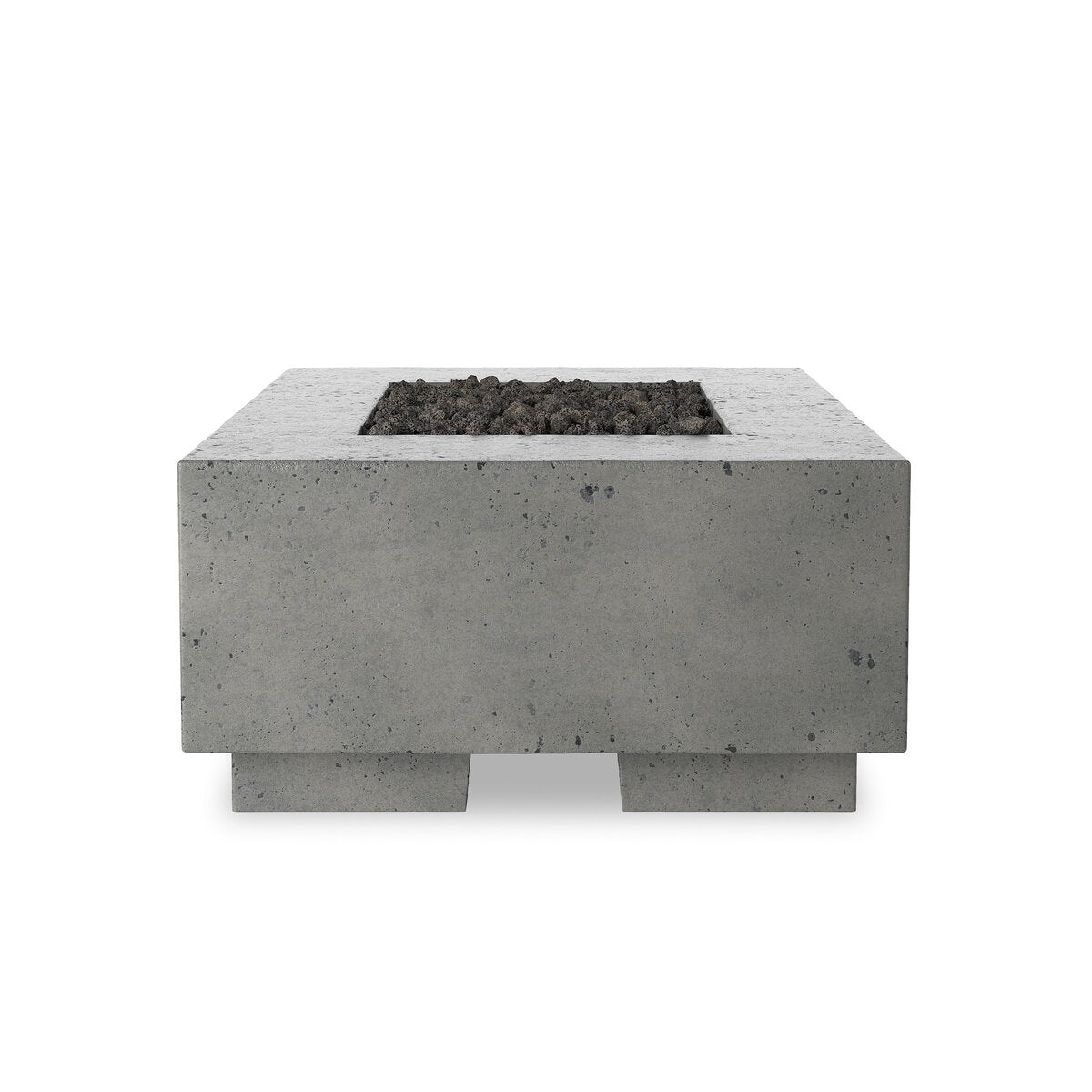 The Outdoor Fire Table is a rectangular, grey piece made from glass-reinforced concrete with a recessed center filled with dark lavastones and set on a white background.