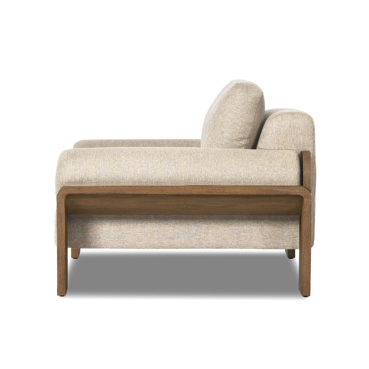 Side view of the Joette Outdoor Chair, a modern beige upholstered seat with cushioned backrest and sturdy wooden frame and legs, set against a plain white background—perfect for displaying chair dimensions and size in any setting.