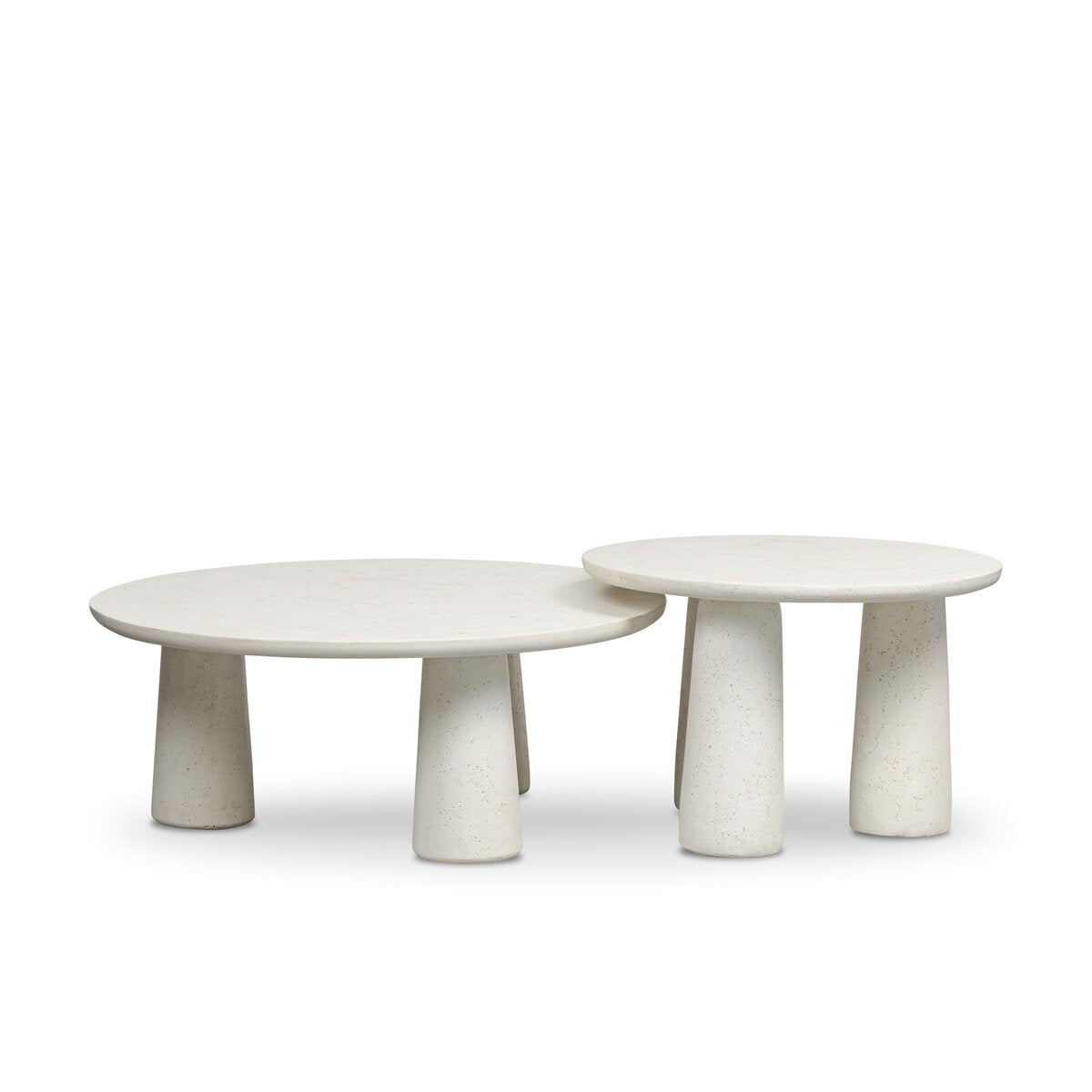 The Concrete Outdoor Nesting Coffee Tables feature two modern, round tables of varying heights and diameters, crafted from cast ivory concrete with three-legged cylindrical bases, displayed side by side on a white background.