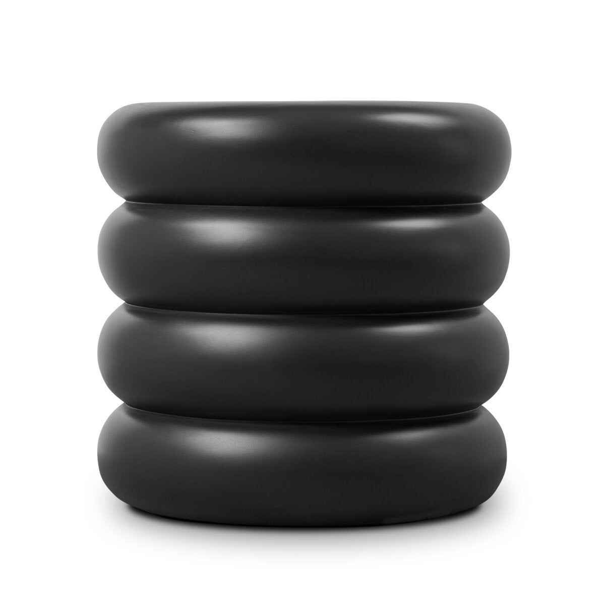 The West End Table, black and stackable with four rounded, cushion-like cylindrical sections resembling inflated rings, sits against a white background as a striking 18-inch side or accent table alternative.