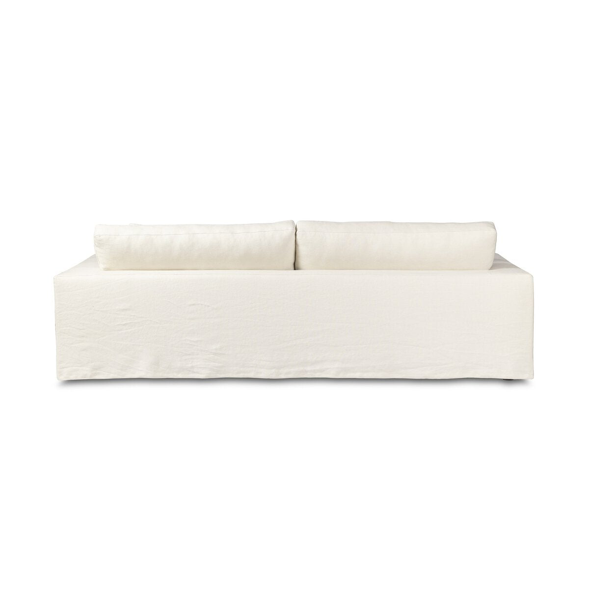 The Outdoor Slipcover Sofa is a minimalist, modern white piece with two large rectangular back cushions and a simple boxy shape, featuring washable hemp upholstery. It is photographed against a plain white background.