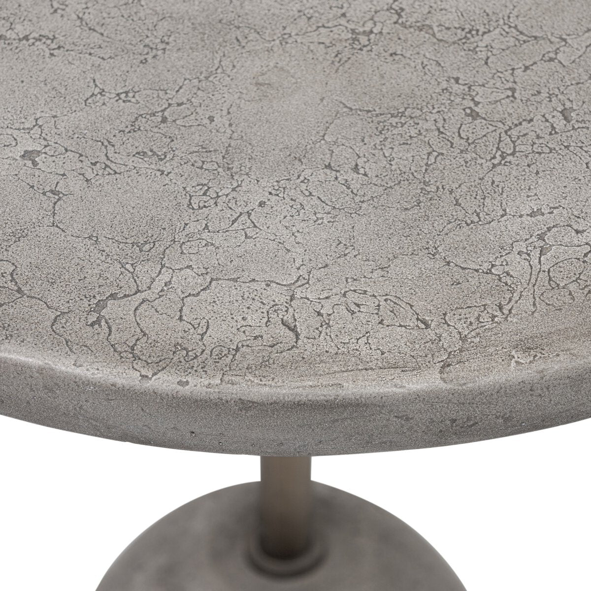 A close-up of the Solid Concrete Outdoor End Table shows its round, marbled surface and cylindrical pedestal base against a white background—ideal for minimalist outdoor entertaining.