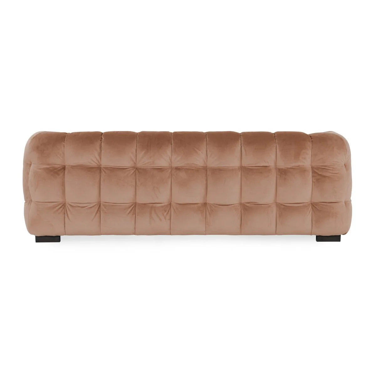 The Velvet Sofa is a modern rectangular piece with a vintage design, upholstered in soft light brown velvet with a grid pattern and low black legs, shown from the back.