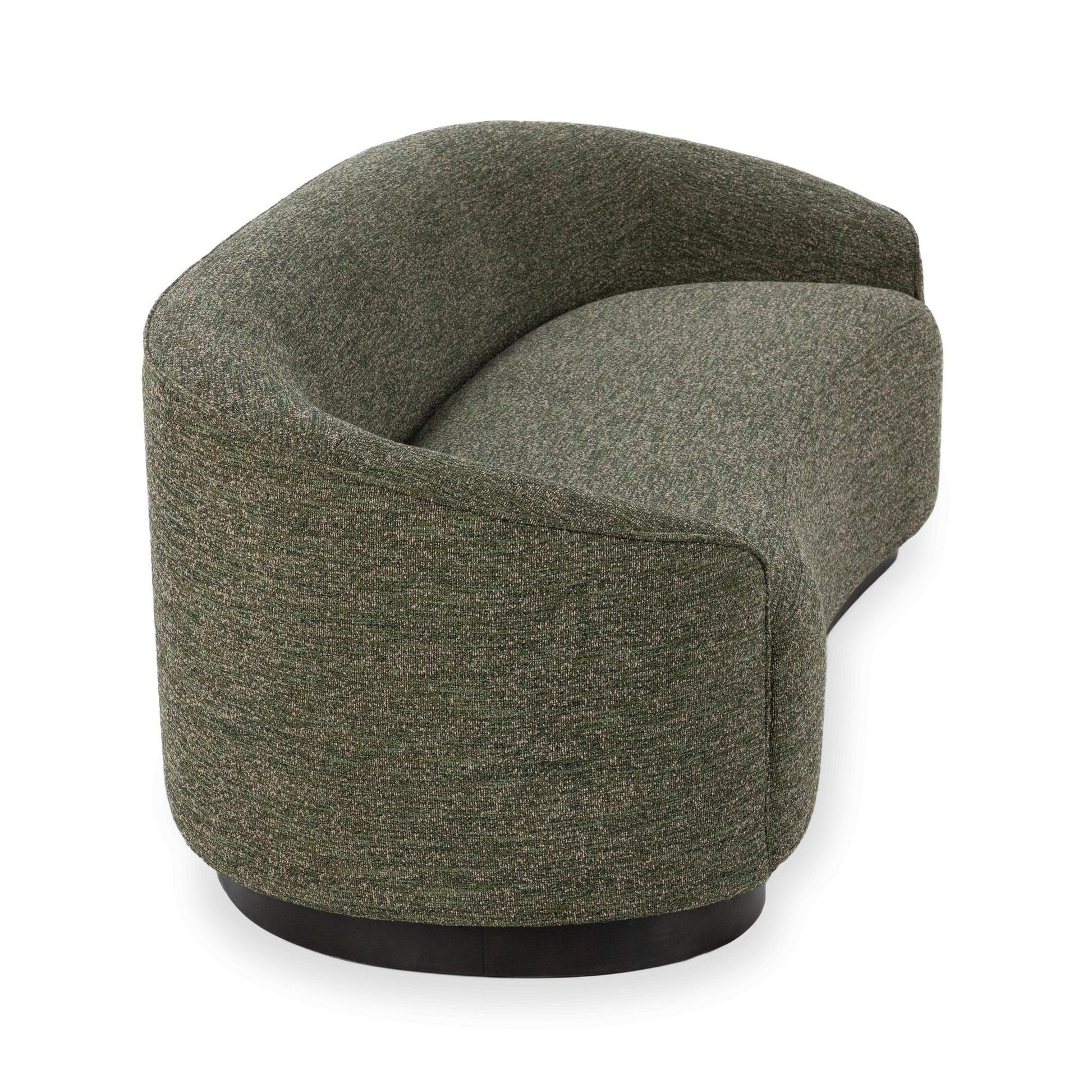The Curved Sofa features green upholstery, a modern rounded back and arms, and sits on a dark circular base, shown against a white background.