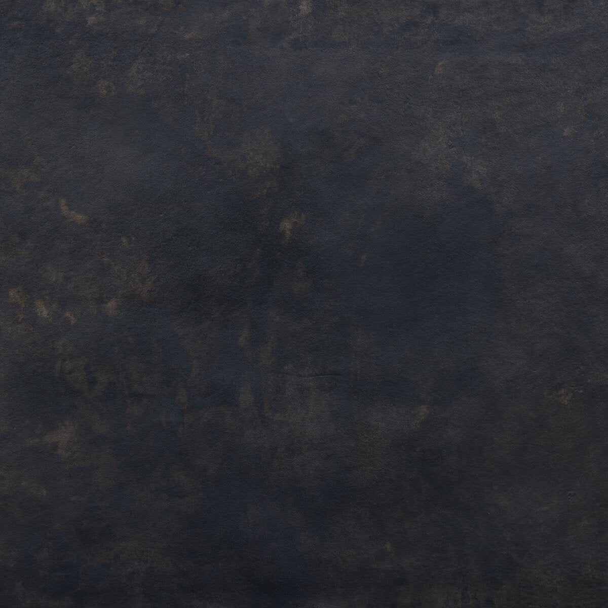 The Arched Base Outdoor Coffee Table2 features a dark, textured surface with subtle brown and black tones, resembling aged leather or stone. Its mottled finish with lighter and darker patches adds character—ideal for your outdoor space.