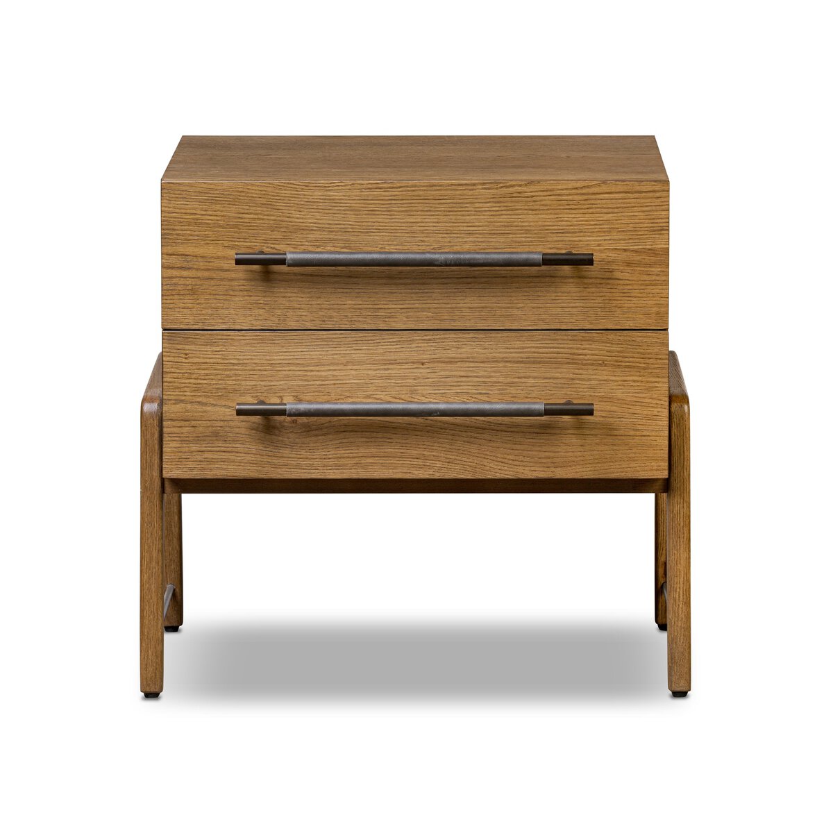 The Oak Nightstand features two oak drawers with long horizontal iron handles, clean modern lines, and a minimalist design. It is displayed against a white background.