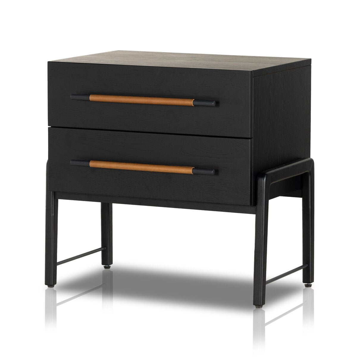 The Oak Nightstand features a black wooden frame, two oak drawers with long brown and black handles, straight legs, and a modern minimalist design, shown against a white background.