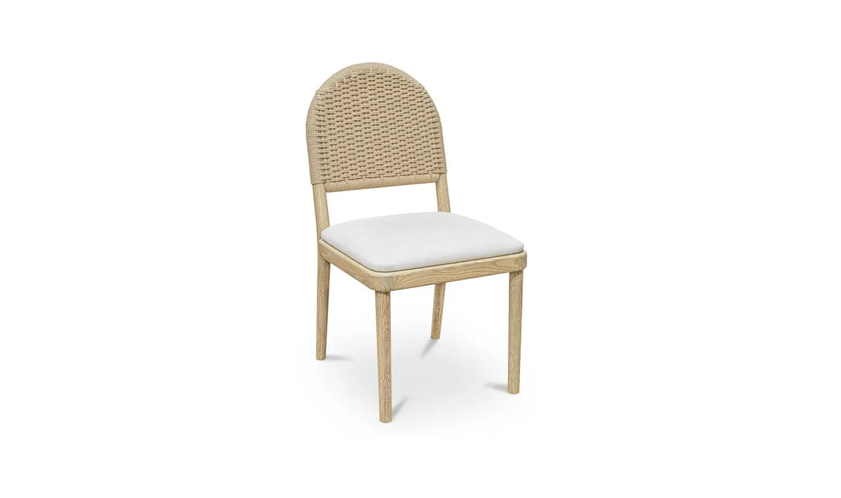 The Natural Oak Dining Chair - Set of Two features wooden frames, woven rounded backrests, and white cushioned seats—an elegant choice with ideal chair dimensions.