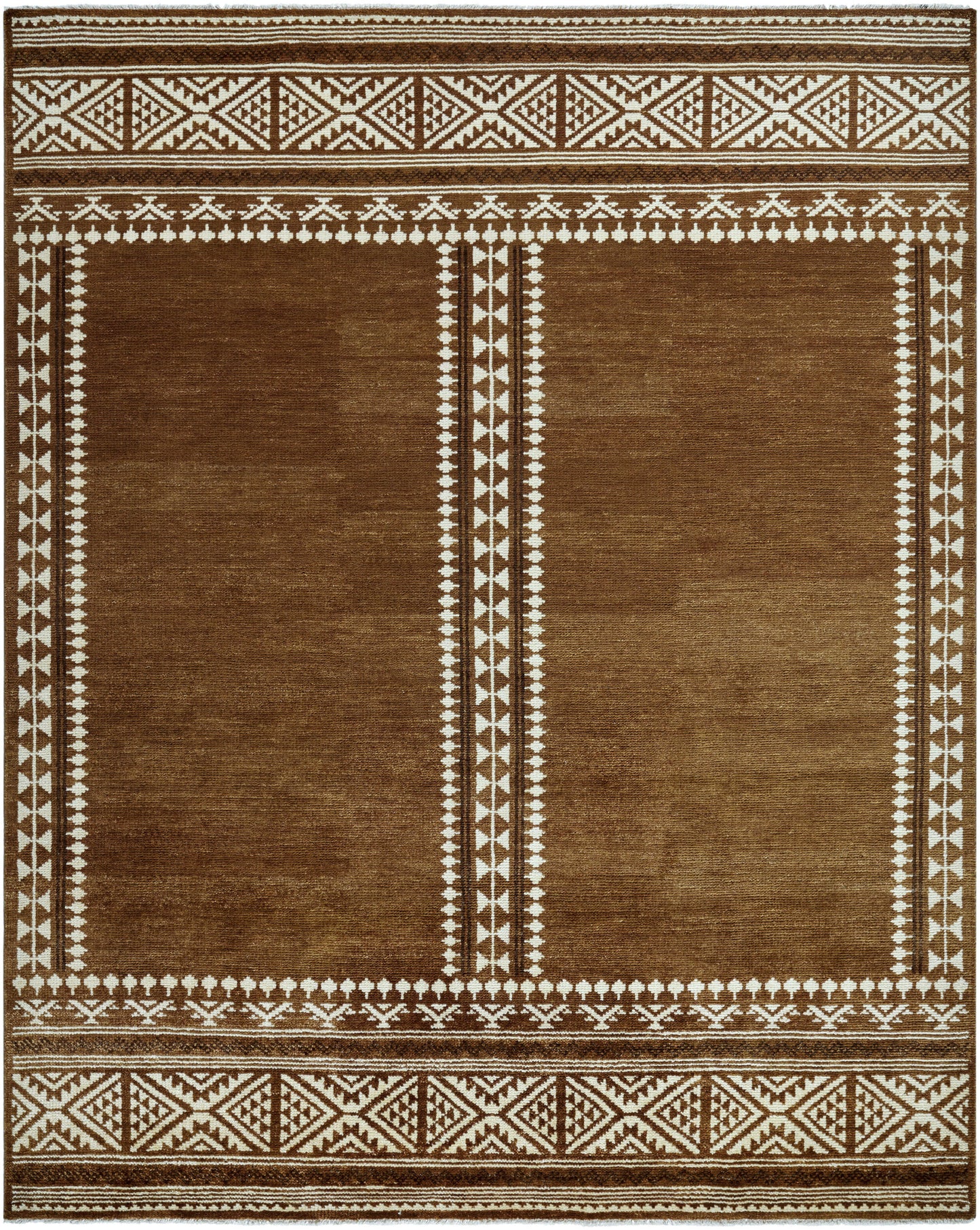 The Brown Tribal Rug (8' x 10') features two vertical panels bordered by white and brown geometric patterns. Intricate diamond and triangle motifs decorate the edges of this hand-knotted wool rug.