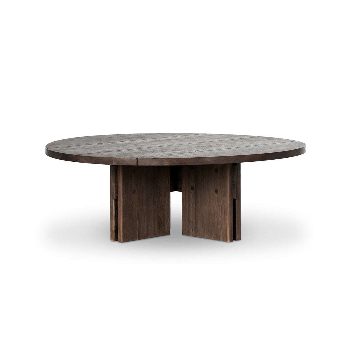 The Teak Outdoor Coffee Table features a round, thick tabletop and intersecting vertical wood panel legs, crafted from FSC-certified teak in a toasted brown finish, shown against a plain white background.