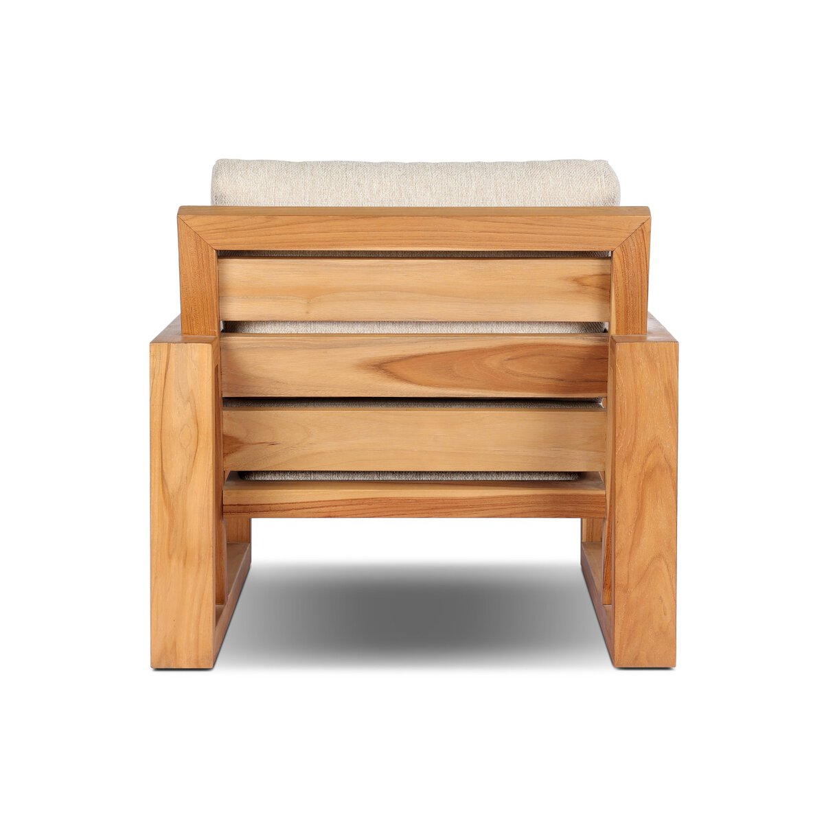 The Nordic Teak Outdoor Chair features a sturdy, minimalist teak frame and a durable white cushion for long-lasting comfort.